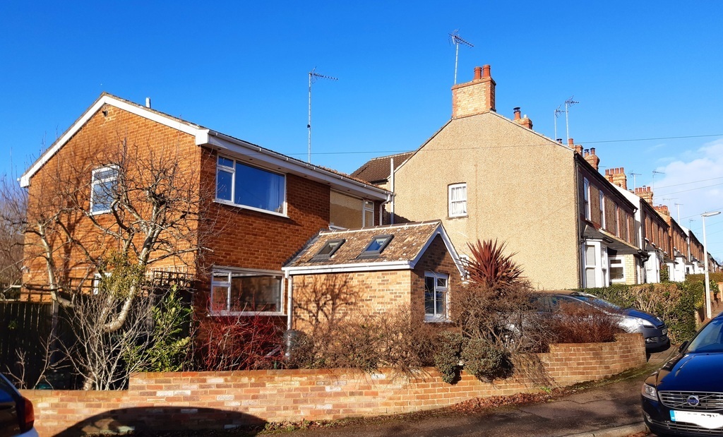 Looking up our pretty street. House on left. 