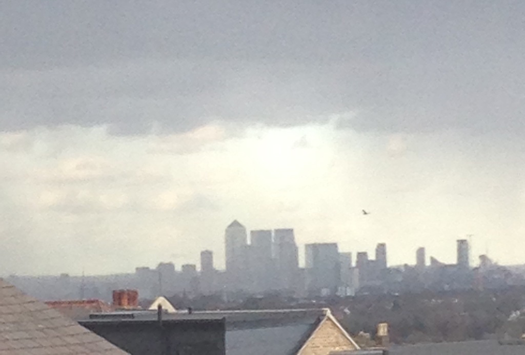 The view from our loft room windows across London to Canary Wharf