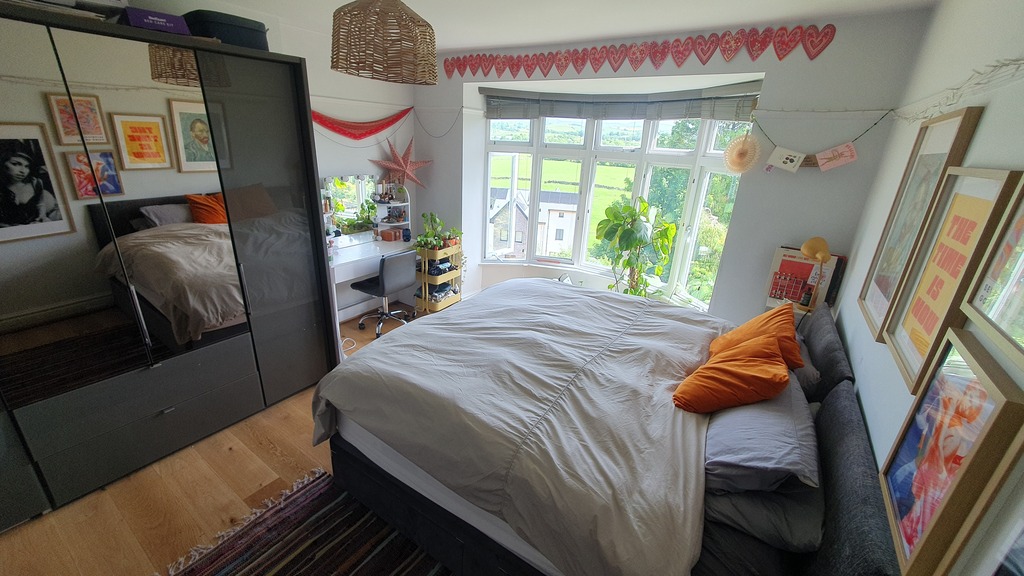 second upstairs bedroom, with two single beds pushed together 