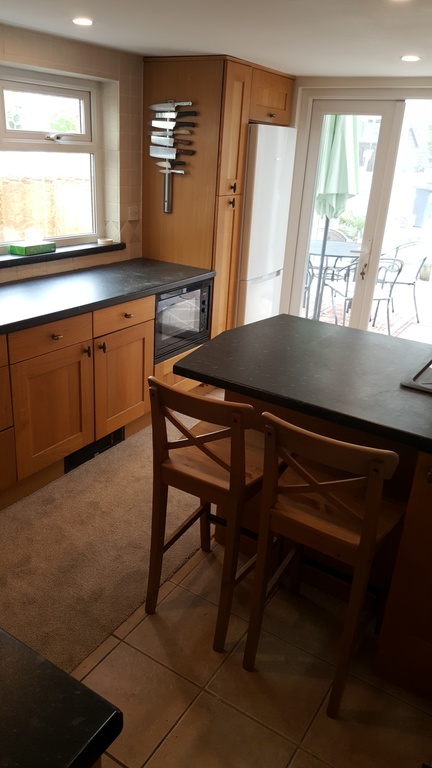 Kitchen.  Fridge/freezer. Dishwasher.  Washer and dryer. 