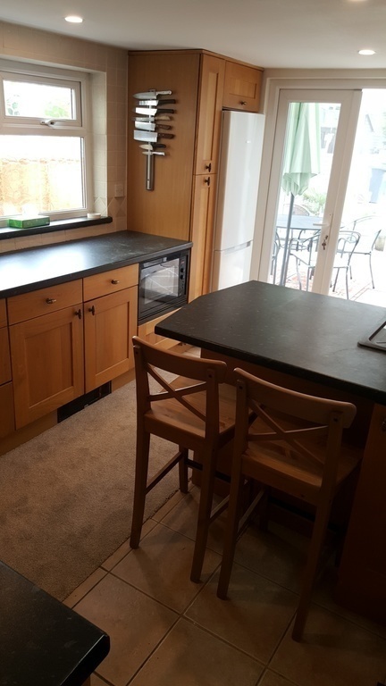 Kitchen.  Fridge/freezer. Dishwasher.  Washer and dryer. 