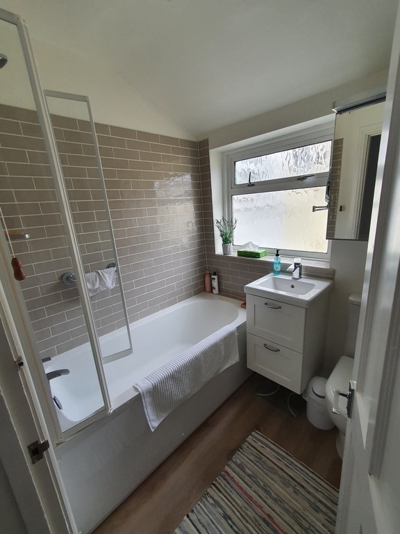 Renovated 2021.  Shower over bath. 