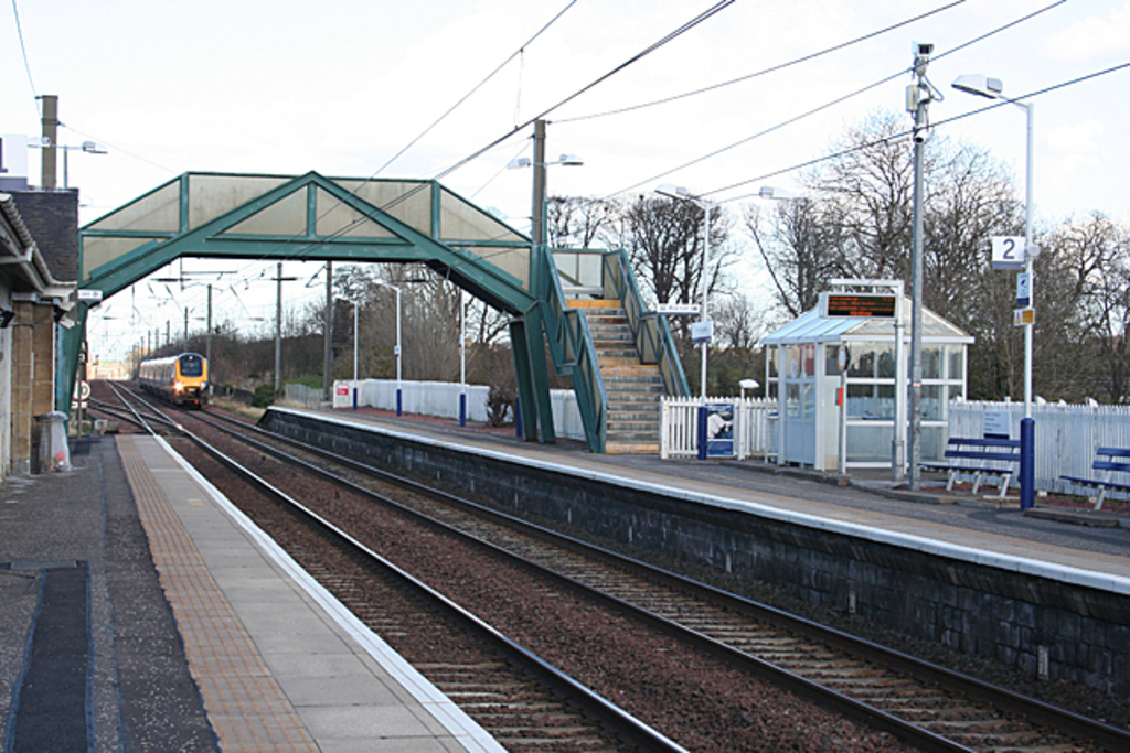 Train Station less than 10 minutes walk away. It also have free car parking and EV charging points.