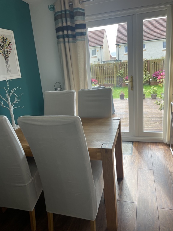 Dining Room with patio doors accessing decking and garden
