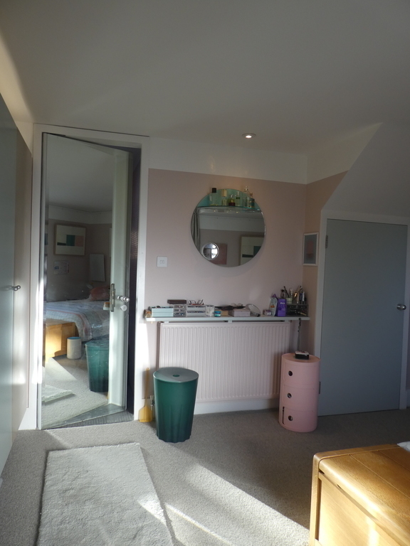 Master bedroom with door to ensuite