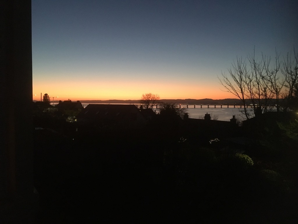 Sunset over Tay Rail Bridge from front of House.