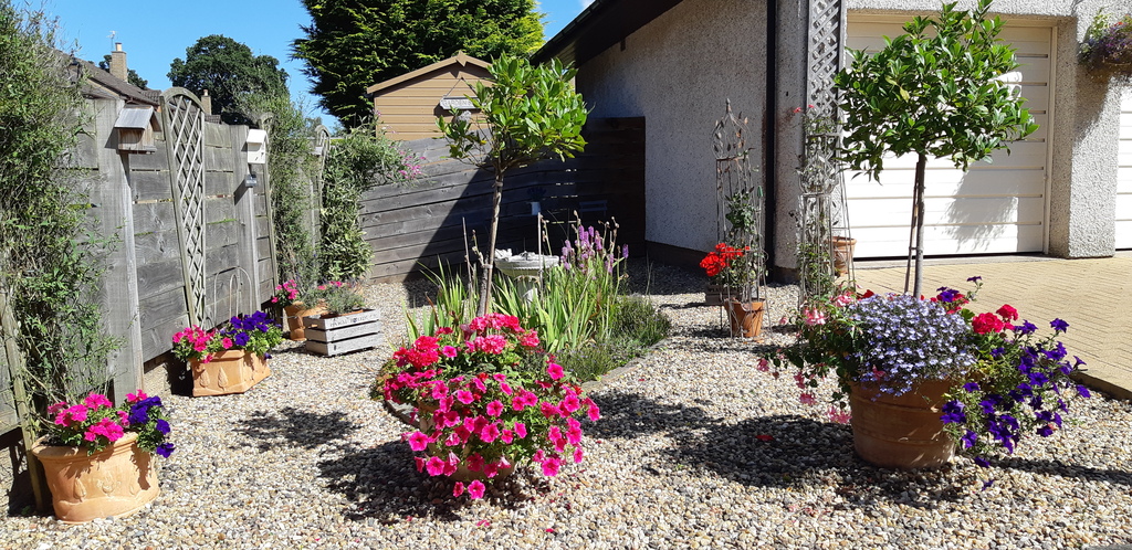 Double garage and side front garden