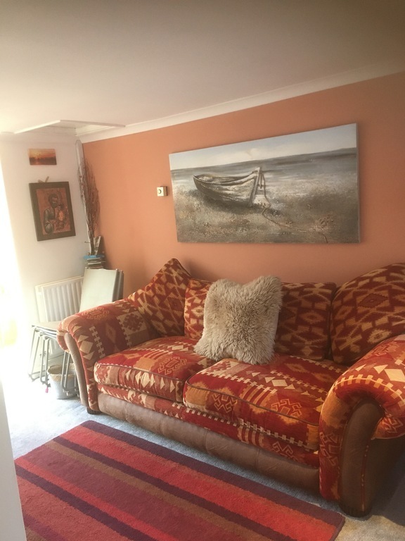 Downstairs small lounge with sofa bed and shower 