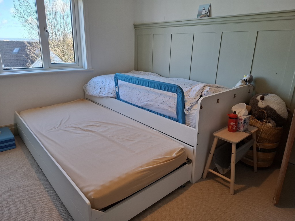 Second bedroom with second bed out