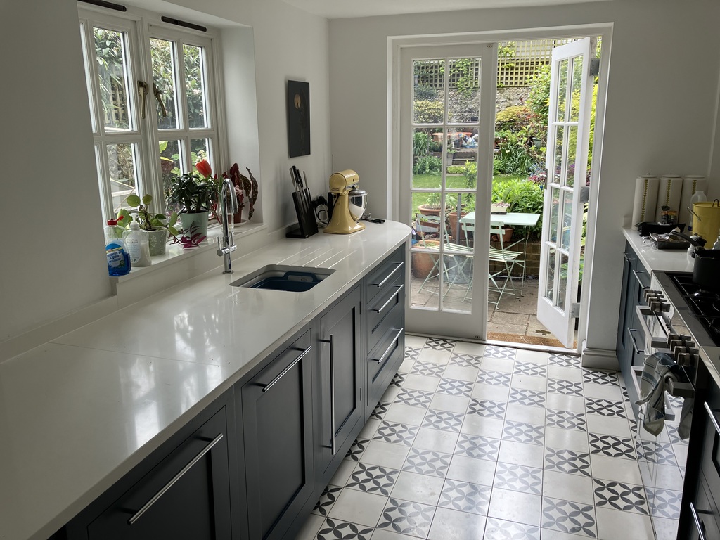 kitchen, with doors leading to back garden