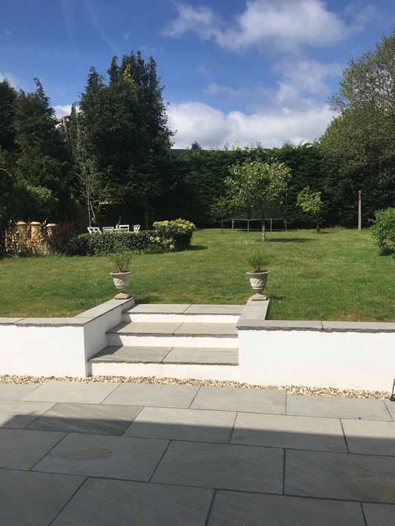 Terrace with steps up to garden