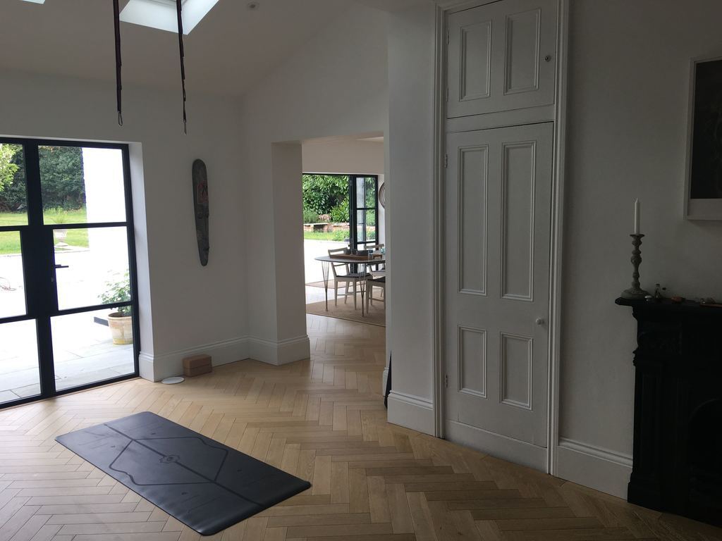 Reading and yoga room with yoga equipment