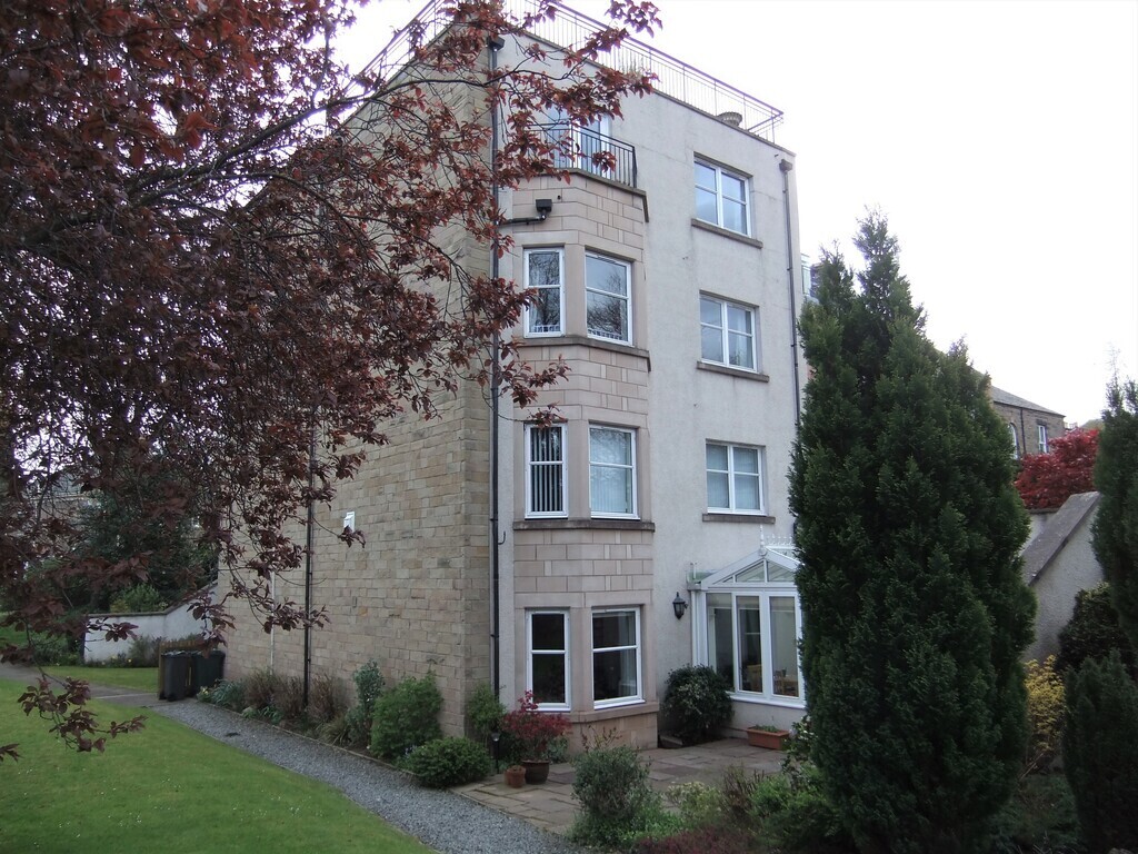 Wing built in 2000.  Top  windows belong to flat. 4 