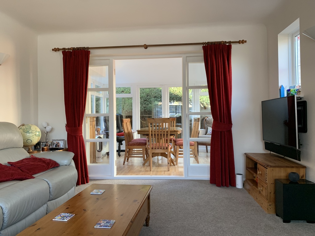 Living room through to dining room.