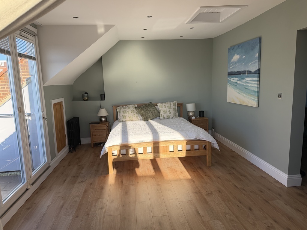 Top floor master bedroom suite - super king bed and Thames Estuary views.
