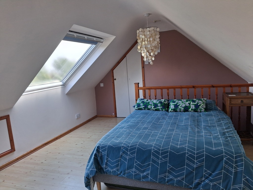 Loft bedroom with double bed