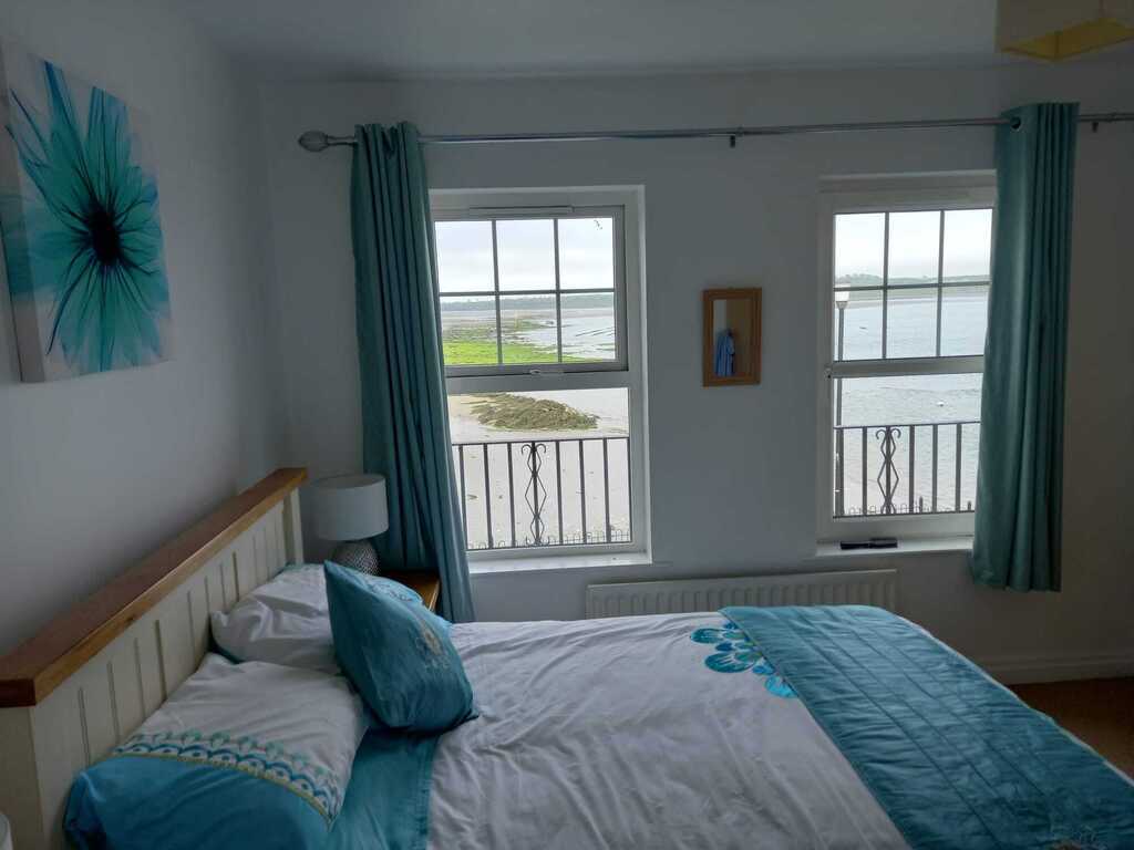 Main bedroom with ensuite and bay views
