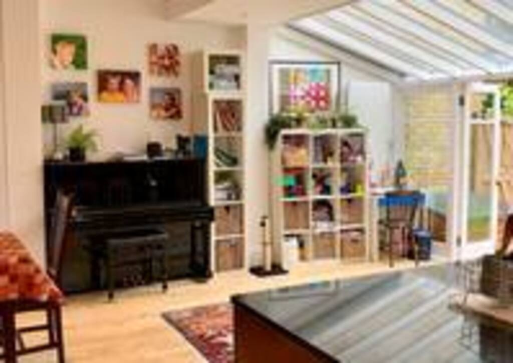 piano and breakfast bar area