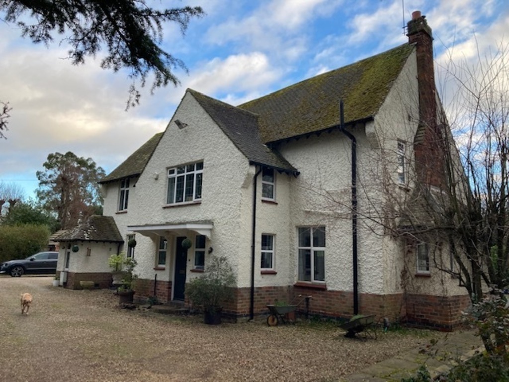 Front of house with Beau