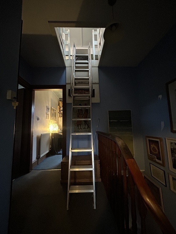 Stair to large floored loft with extra sleeping space