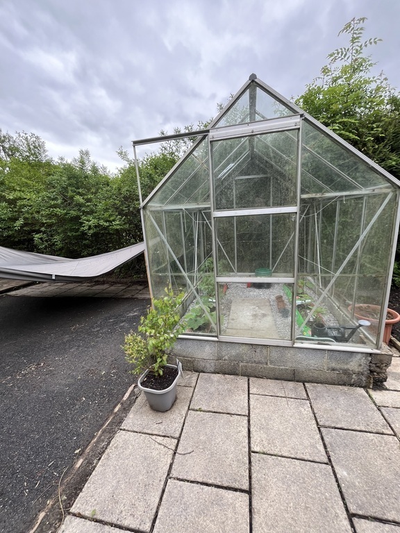 Greenhouse - tomatoes, cucumber and peppers for you to eat if available.