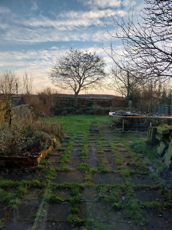 Back garden with access from patio doors / lounge