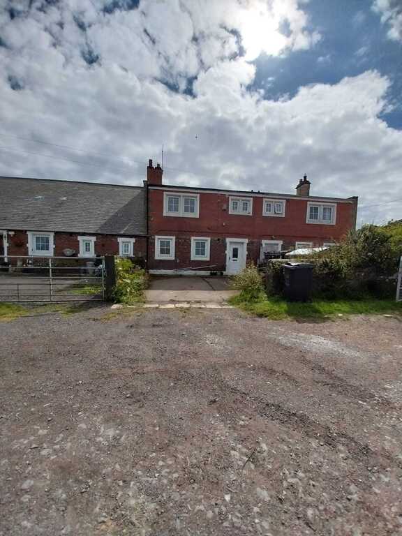 Front of the house with parking