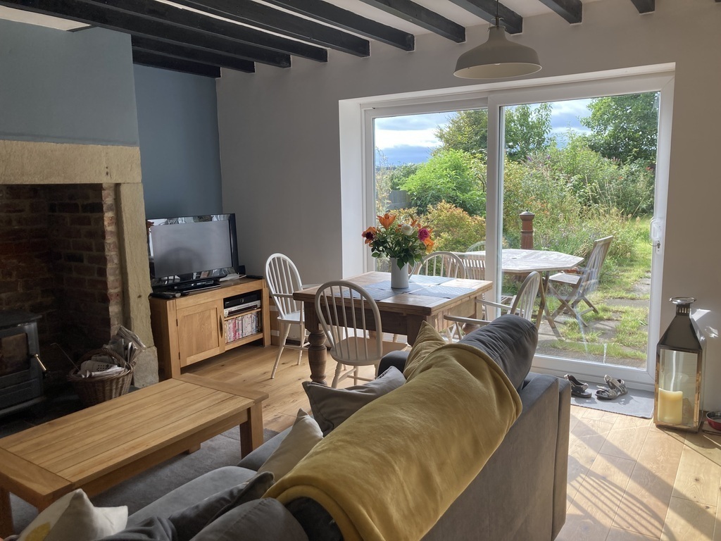 Lounge with access to the garden via patio doors