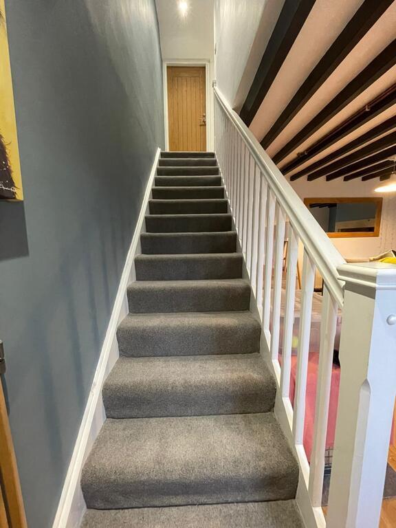 Stairs with baby gate at the bottom of the stairs ( no baby gate at the top of the stairs)