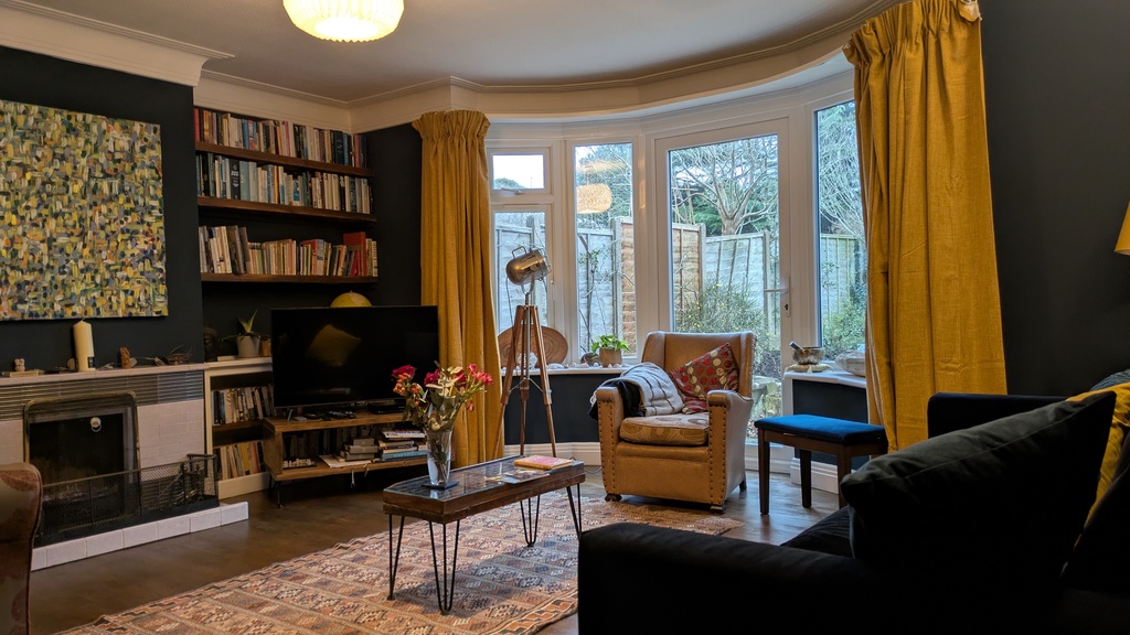 Our recently decorated sitting room with home made furniture and books to enjoy reading. 