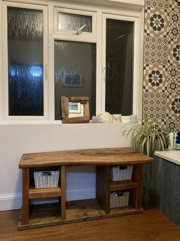 Plenty of storage and towels in the family bathroom