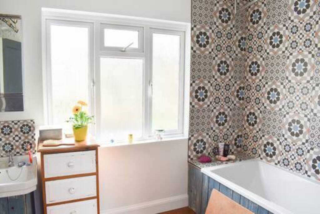 Spacious family bathroom with bath