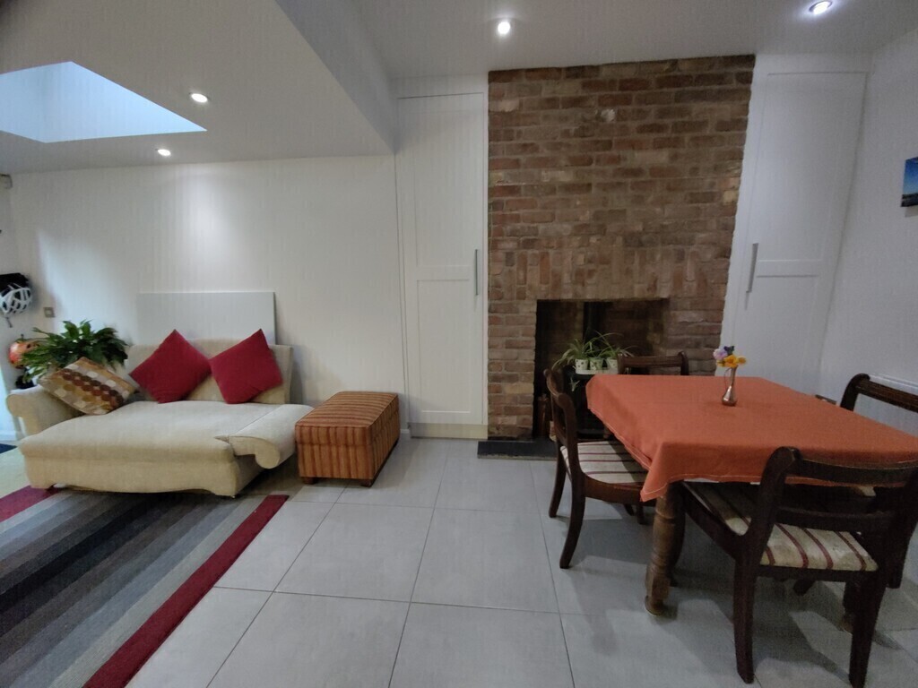 Cosy dining area beside the woodstove