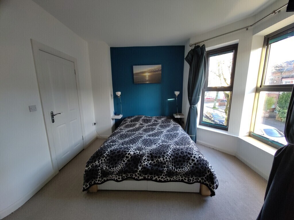 Main bedroom with king-size futon on tatami mats - a really solid bed