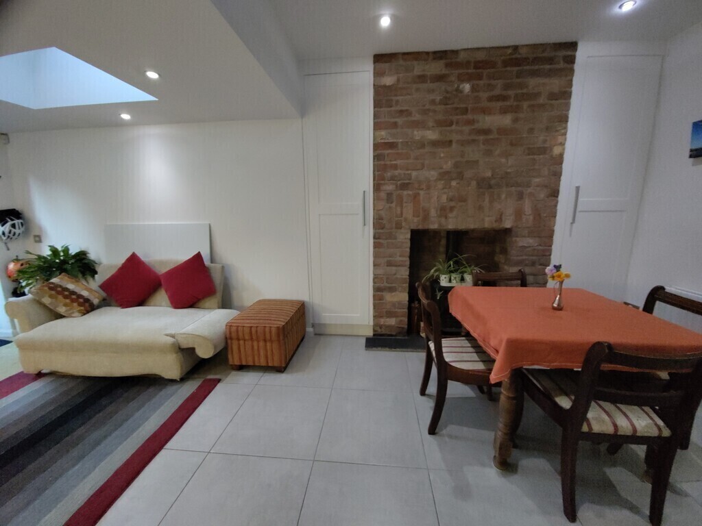 Cosy dining area beside the woodstove