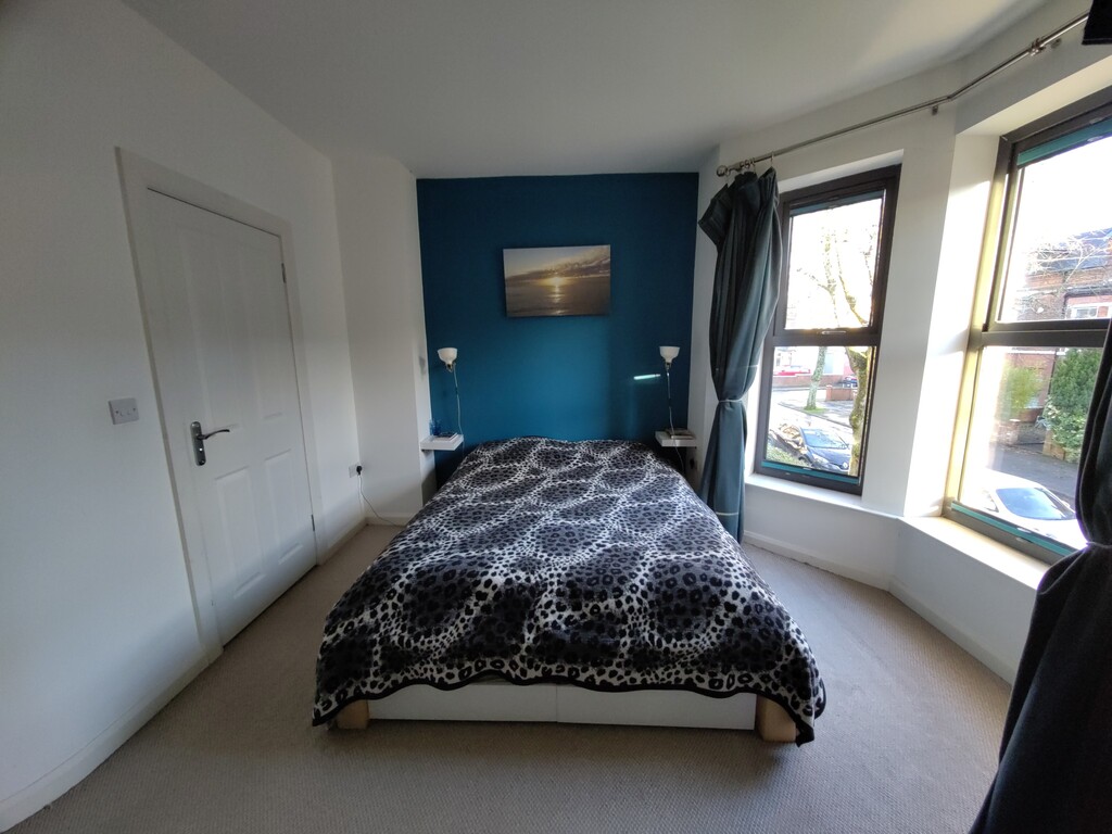Main bedroom with king-size futon on tatami mats - a really solid bed