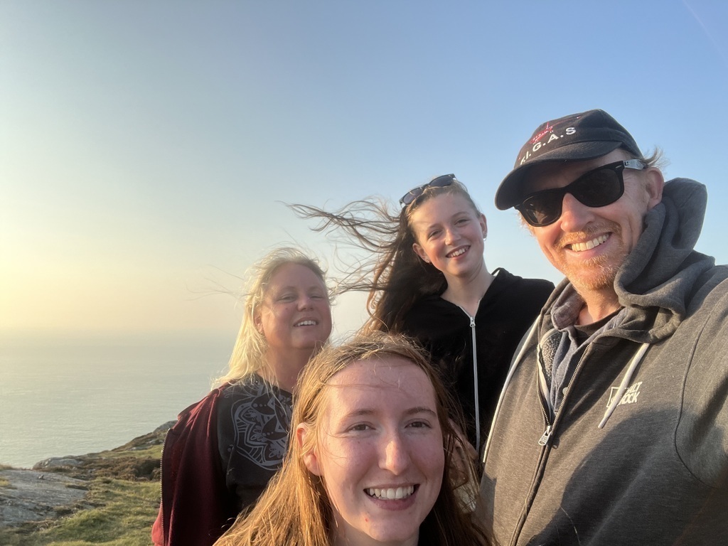 Chris, Sue, Myfi and Alys on top of a mountain