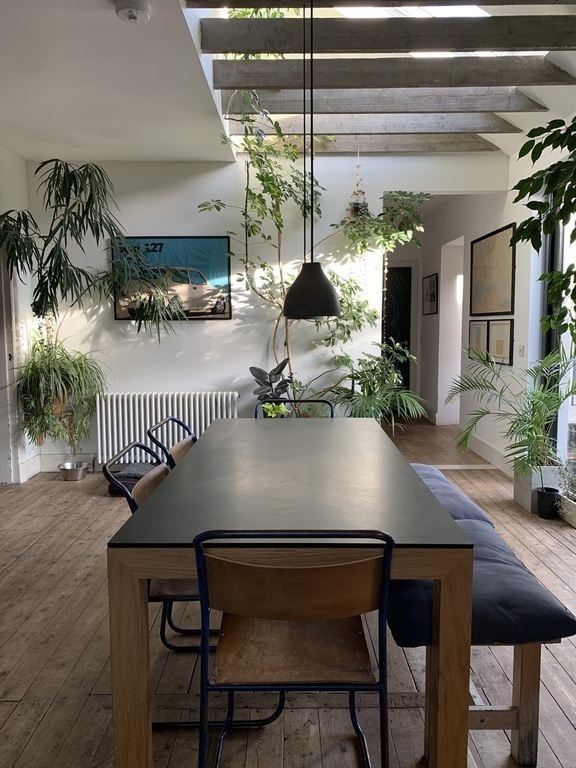 Light-filled south-facing kitchen. Large table. 