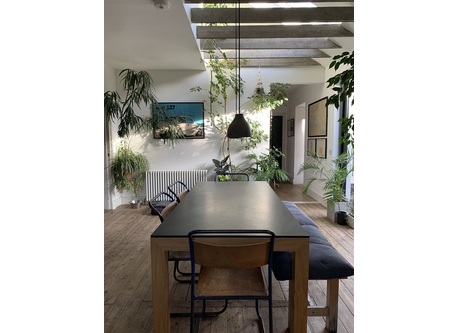 Light-filled south-facing kitchen. Large table. 