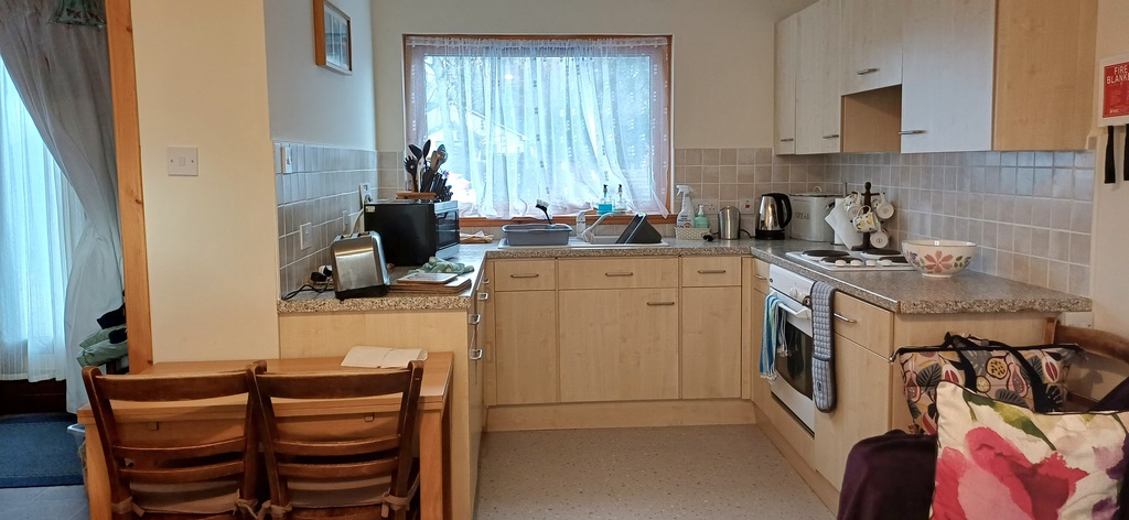 Fully equipped kitchen area off lounge . All electric. 