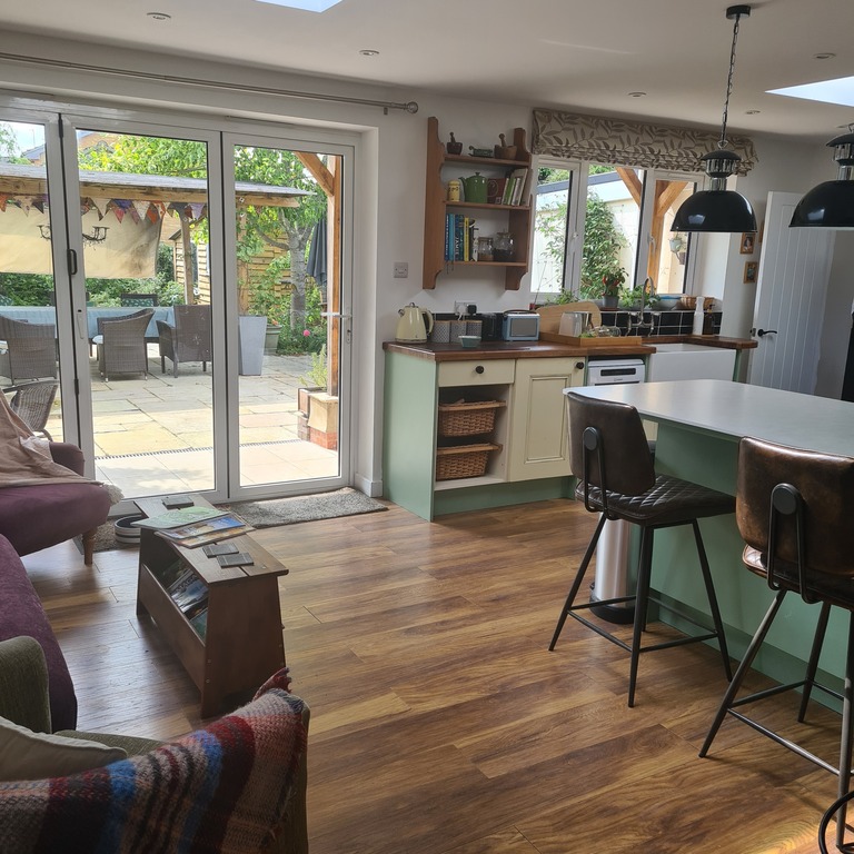 Part of the reception area and kitchen