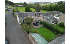 Aerial view of the house - it is the one on the left