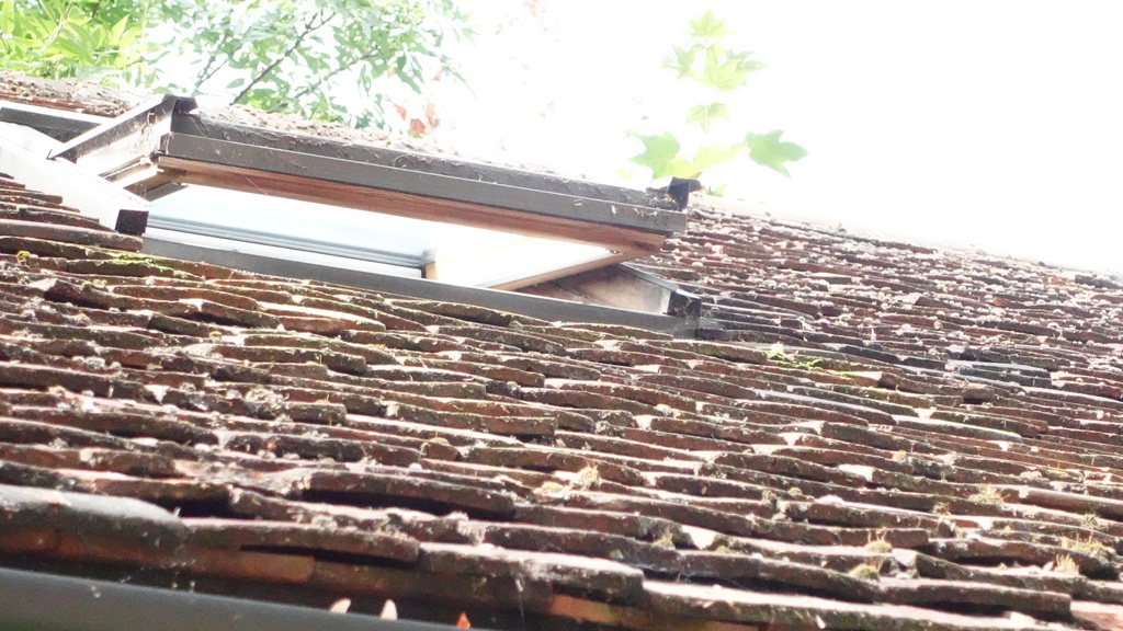 Old plain clay roof tiles detail