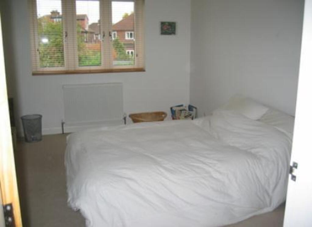 The double bedroom which looks out over the garden