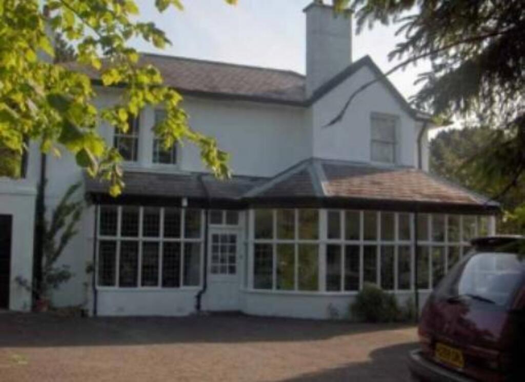 Facing the driveway. 