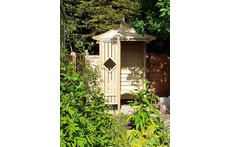 Corner gazebo in the rear woodland garden