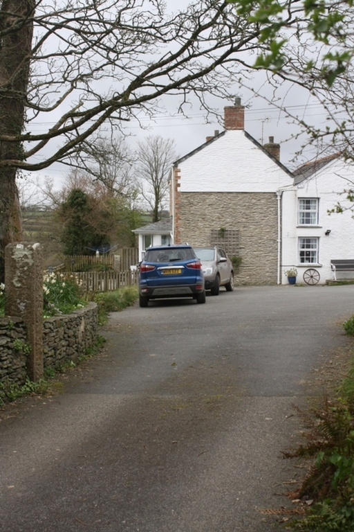 Entrance to the Farmhouse courtyard. Dove Cottage on the left.