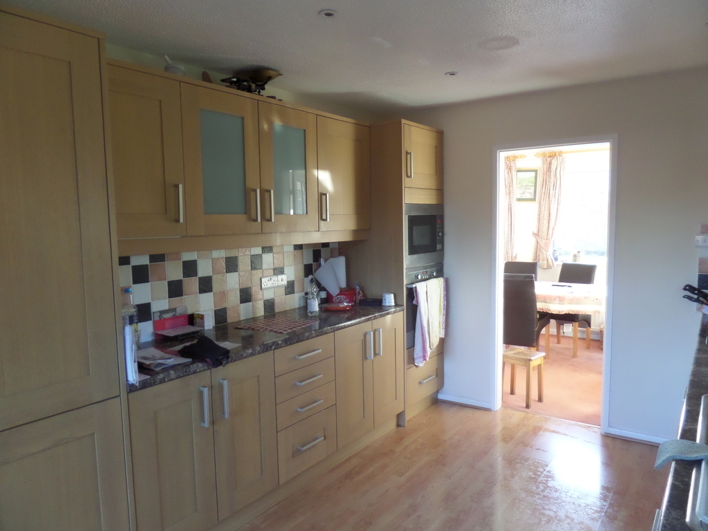 Kitchen with entrance to lounge