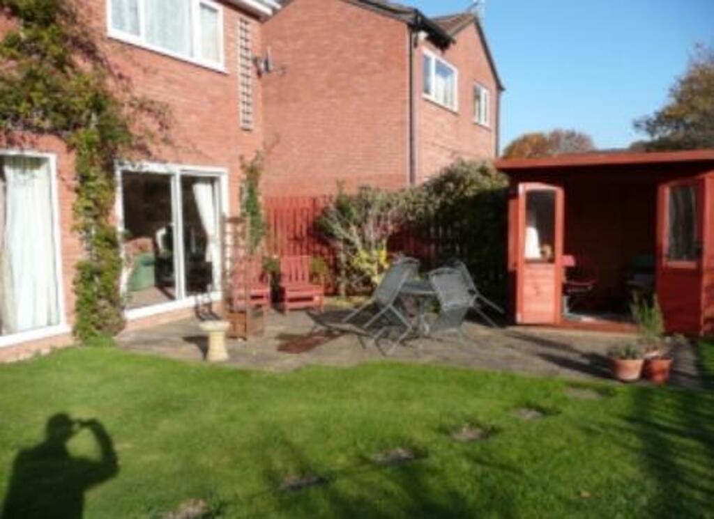 Garden patio with summer house