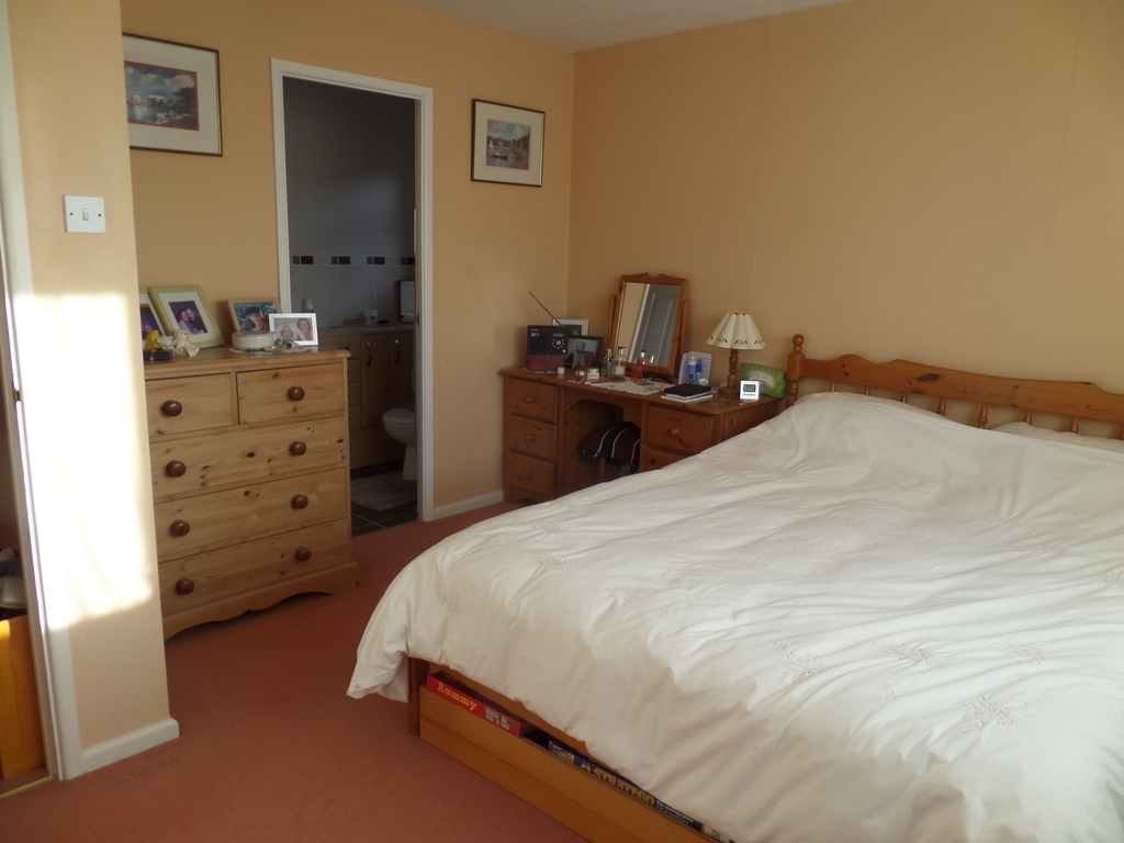 Main bedroom showing entry to en-suite bathroom.